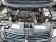 2005 Dodge Caravan SXT z VIN 2D4GP44L05R437535, wystawiony jako Copart lot #90143595 z przebiegiem 209 193 mil mil oraz Szkoda całkowita • Salvage title. Historia ofert i sprzedaży dostępna na DreamBid. Obrazek 12.