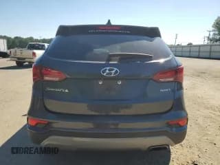 ✅ 2018 Hyundai Santa Fe 2.4L • VIN: 5XYZU3LB6JG522640 • Лот: 59038864. Опубликован ранее на Copart с пробегом 82 372 миль. Бесплатный доступ к архиву аукционных продаж из США и подробный отчёт об истории автомобиля на DreamBid. Изображение 6.
