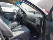 ✅ 2009 Chevrolet Aveo 1LT • VIN: KL1TD66E59B631584 • Lot: 41767703. Wystawiony na IAAI z przebiegiem 160 423 mil. Bezpłatny archiwum sprzedaży aukcyjnych z USA i szczegółowy raport historii pojazdu na DreamBid. Zdjęcie 5.