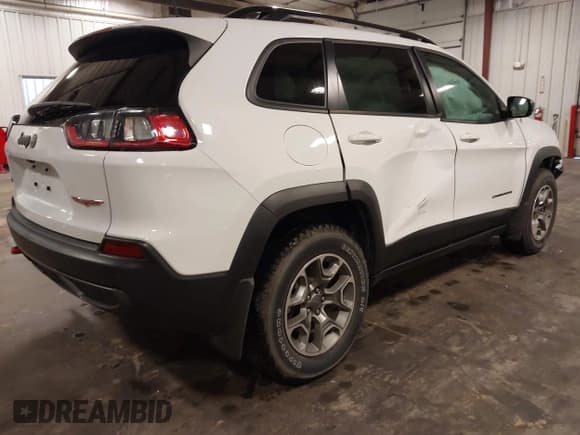 ✅ 2022 Jeep Cherokee Trailhawk • VIN: 1C4PJMBX9ND504737 • Lot: 42253723. Listed on IAAI with 25,235 mi. Free auction sales archive from the USA and detailed vehicle history report at DreamBid. Image 4.