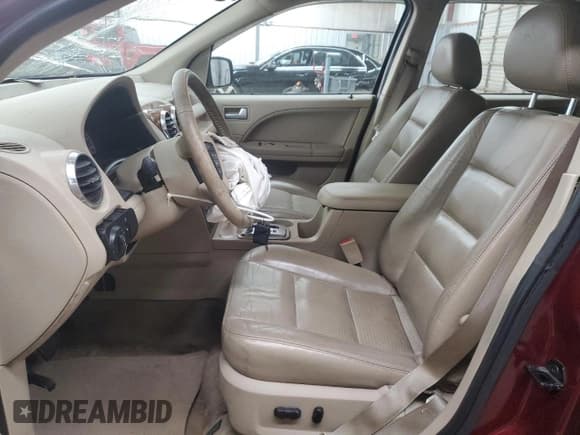 ✅ 2005 Ford Freestyle Limited • VIN: 1FMZK031X5GA80956 • Lot: 89846395. Wystawiony na Copart z przebiegiem 177 700 mil. Bezpłatny archiwum sprzedaży aukcyjnych z USA i szczegółowy raport historii pojazdu na DreamBid. Zdjęcie 7.