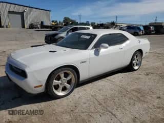 2012 Dodge Challenger R/T Plus с VIN 2C3CDYBTXCH149947, выставлен на аукционе Copart как лот 82691125 с пробегом 82 364 миль миль и Чистый • Clean title. История ставок и продаж доступна на DreamBid. Изображение 1.