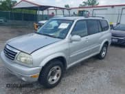 ✅ 2002 Suzuki XL7 Standard • VIN: JS3TX92V624124535 • Lot: 42522274. Listed on IAAI with 180,814 mi. Free auction sales archive from the USA and detailed vehicle history report at DreamBid. Image 6.