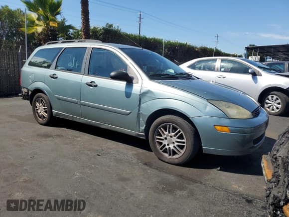 ✅ 2003 Ford Focus • VIN: 1FAHP36Z93W237843 • Lot: 82134115. Listed on Copart with 133,067 mi. Free auction sales archive from the USA and detailed vehicle history report at DreamBid. Image 4.