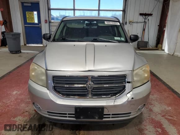 ✅ 2010 Dodge Caliber Mainstreet • VIN: 1B3CB3HA0AD599676 • Лот: 89916905. Опубликован ранее на Copart с пробегом 88 102 миль. Бесплатный доступ к архиву аукционных продаж из США и подробный отчёт об истории автомобиля на DreamBid. Изображение 5.