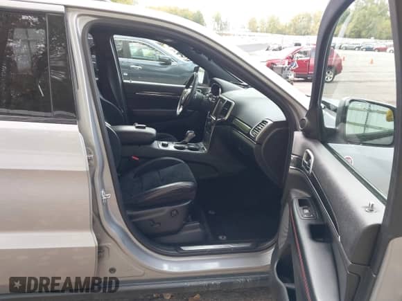 2017 Jeep Grand Cherokee Trailhawk with VIN 1C4RJFLG1HC733460, listed as a IAAI auction lot 43428007 with 149,029 mi miles and . Bid and sale history available at DreamBid. Image 5.