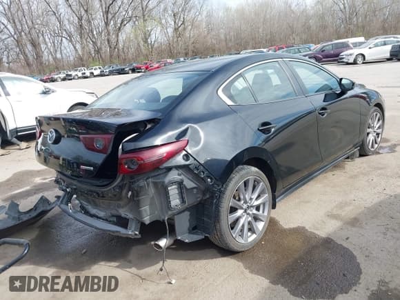 ✅ 2021 Mazda 3 Select • VIN: JM1BPABL7M1323365 • Лот: 41879962. Опубликован ранее на IAAI с пробегом 65 651 миль. Бесплатный доступ к архиву аукционных продаж из США и подробный отчёт об истории автомобиля на DreamBid. Изображение 4.