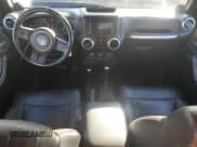 ✅ 2012 Jeep Wrangler Unlimited Sahara • VIN: 1C4HJWEG5CL202201 • Lot: 86854385. Wystawiony na Copart z przebiegiem 171 223 mil. Bezpłatny archiwum sprzedaży aukcyjnych z USA i szczegółowy raport historii pojazdu na DreamBid. Zdjęcie 8.