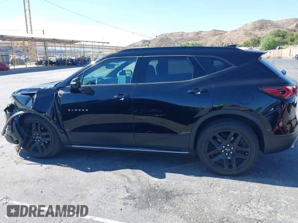 2019 Chevrolet Blazer z VIN 3GNKBDRS7KS680237, wystawiony jako IAAI lot #43514162 z przebiegiem 94 324 mil mil oraz . Historia ofert i sprzedaży dostępna na DreamBid. Obrazek 14.