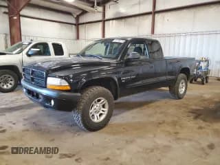 ✅ 2002 Dodge Dakota Sport • VIN: 1B7GG32N02S582645 • Lot: 67796775. Wystawiony na Copart z przebiegiem 159 124 mil. Bezpłatny archiwum sprzedaży aukcyjnych z USA i szczegółowy raport historii pojazdu na DreamBid. Zdjęcie 1.