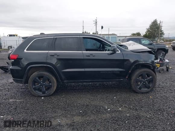 ✅ 2015 Jeep Grand Cherokee Laredo • VIN: 1C4RJFAG0FC154458 • Lot: 41209018. Listed on IAAI with 269,929 mi. Free auction sales archive from the USA and detailed vehicle history report at DreamBid. Image 14.