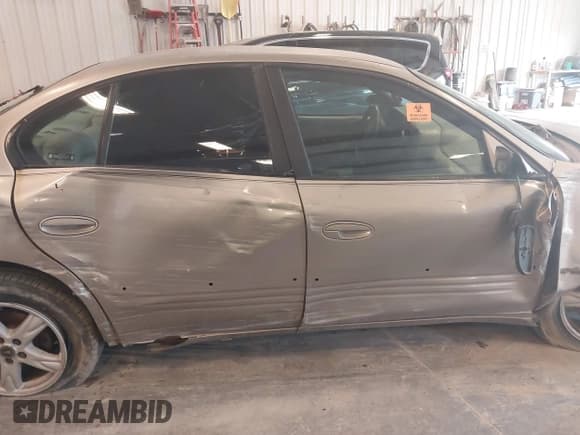 ✅ 2002 Pontiac Bonneville SLE • VIN: 1G2HY54K024229962 • Lot: 42345894. Wystawiony na IAAI z przebiegiem 153 719 mil. Bezpłatny archiwum sprzedaży aukcyjnych z USA i szczegółowy raport historii pojazdu na DreamBid. Zdjęcie 13.