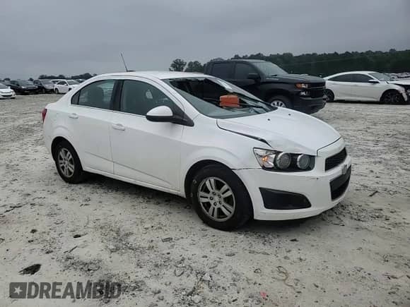 2015 Chevrolet Sonic LT z VIN 1G1JC5SHXF4103013, wystawiony jako Copart lot #71414114 z przebiegiem 169 575 mil mil oraz Szkoda całkowita • Salvage title. Historia ofert i sprzedaży dostępna na DreamBid. Obrazek 11.