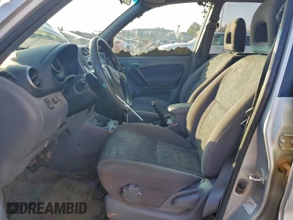 ✅ 2003 Toyota RAV4 • VIN: JTEGH20V830107215 • Лот: 94493765. Опубликован ранее на Copart с пробегом 252 429 миль. Бесплатный доступ к архиву аукционных продаж из США и подробный отчёт об истории автомобиля на DreamBid. Изображение 7.