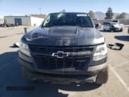 ✅ 2019 Chevrolet Colorado 4WD ZR2 • VIN: 1GCGTEENXK1338557 • Лот: 82151483. Опубликован ранее на Copart с пробегом 57 180 миль. Бесплатный доступ к архиву аукционных продаж из США и подробный отчёт об истории автомобиля на DreamBid. Изображение 5.