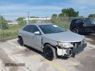 ✅ 2014 Toyota Camry L • VIN: 4T1BF1FK1EU765218 • Lot: 43211127. Listed on IAAI with 151,964 mi. Free auction sales archive from the USA and detailed vehicle history report at DreamBid. Image 1.