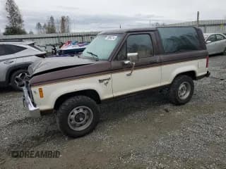 ✅ 1986 Ford Bronco • VIN: 1FMCU14T1GUB14387 • Lot: 76962214. Listed on Copart with 785,536 mi. Free auction sales archive from the USA and detailed vehicle history report at DreamBid. Image 1.