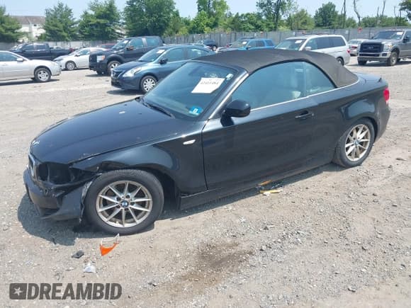 ✅ 2010 BMW 1 Series 128i • VIN: WBAUN1C55AVH81750 • Lot: 42411484. Listed on IAAI with 124,432 mi. Free auction sales archive from the USA and detailed vehicle history report at DreamBid. Image 17.