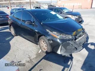 2020 Toyota Prius LE z VIN JTDKARFPXL3122169, wystawiony jako IAAI lot #43041377 z przebiegiem 165 757 mil mil oraz . Historia ofert i sprzedaży dostępna na DreamBid. Obrazek 1.