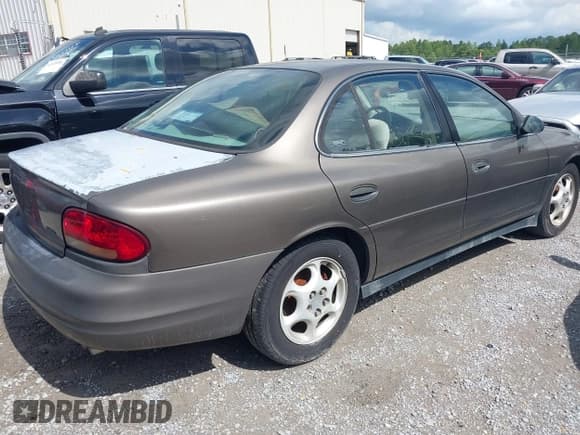 ✅ 1999 Oldsmobile Intrigue GX • VIN: 1G3WH52H0XF377325 • Lot: 42479174. Wystawiony na IAAI z przebiegiem 108 836 mil. Bezpłatny archiwum sprzedaży aukcyjnych z USA i szczegółowy raport historii pojazdu na DreamBid. Zdjęcie 4.