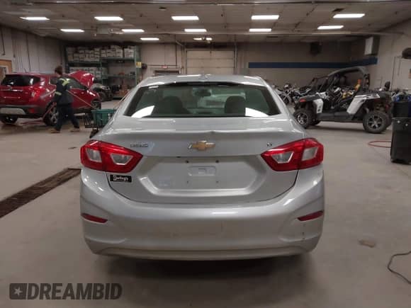 2017 Chevrolet Cruze LT with VIN 3G1BE5SM8HS571093, listed as a IAAI auction lot 43222199 with 137,766 mi miles and . Bid and sale history available at DreamBid. Image 16.