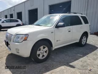 ✅ 2009 Mercury Mariner Hybrid • VIN: 4M2CU29369KJ17250 • Лот: 66400405. Опубликован ранее на Copart с пробегом 132 626 миль. Бесплатный доступ к архиву аукционных продаж из США и подробный отчёт об истории автомобиля на DreamBid. Изображение 1.