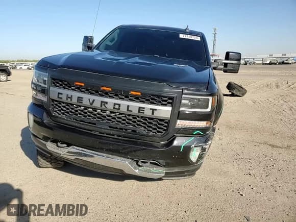 ✅ 2016 Chevrolet Silverado 1500 LT • VIN: 3GCUKREC1GG108071 • Лот: 71240724. Опубликован ранее на Copart с пробегом 124 098 миль. Бесплатный доступ к архиву аукционных продаж из США и подробный отчёт об истории автомобиля на DreamBid. Изображение 11.
