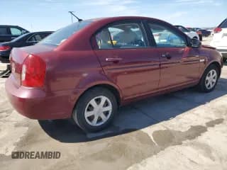 ✅ 2007 Hyundai Accent GLS • VIN: KMHCN46C77U123350 • Лот: 46856845. Опубликован ранее на Copart с пробегом 150 833 миль. Бесплатный доступ к архиву аукционных продаж из США и подробный отчёт об истории автомобиля на DreamBid. Изображение 3.