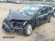 ✅ 2014 Ford Focus Titanium • VIN: 1FADP3N25EL194433 • Lot: 42512912. Listed on IAAI with 105,355 mi. Free auction sales archive from the USA and detailed vehicle history report at DreamBid. Image 17.