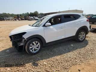 2019 Hyundai Tucson SE z VIN KM8J23A46KU842883, wystawiony jako Copart lot #81144025 z przebiegiem 74 595 mil mil oraz Szkoda całkowita • Salvage title. Historia ofert i sprzedaży dostępna na DreamBid. Obrazek 1.