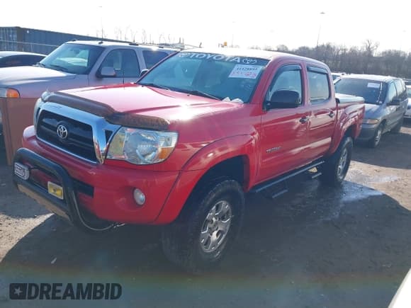 ✅ 2007 Toyota Tacoma PreRunner • VIN: 5TEJU62N97Z469800 • Lot: 41428895. Listed on IAAI with 164,222 mi. Free auction sales archive from the USA and detailed vehicle history report at DreamBid. Image 2.