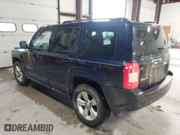 ✅ 2014 Jeep Patriot Latitude • VIN: 1C4NJRFB0ED730765 • Lot: 42309571. Listed on IAAI with 218,577 mi. Free auction sales archive from the USA and detailed vehicle history report at DreamBid. Image 3.