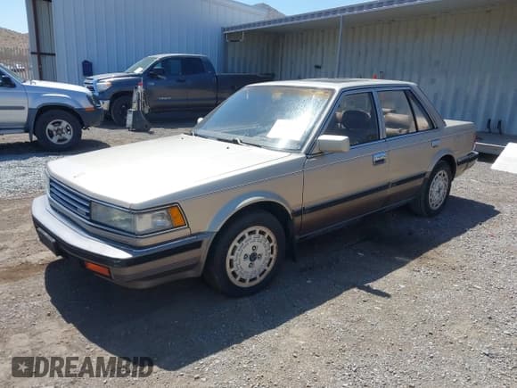 ✅ 1986 Nissan Maxima • VIN: JN1HU11S5GT145169 • Лот: 42472765. Опубликован ранее на IAAI с пробегом 173 183 миль. Бесплатный доступ к архиву аукционных продаж из США и подробный отчёт об истории автомобиля на DreamBid. Изображение 2.