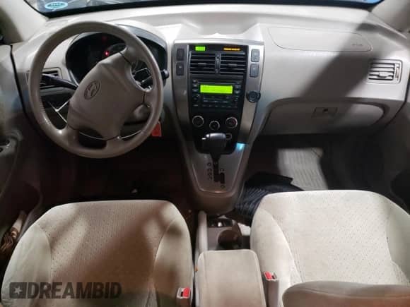 2005 Hyundai Tucson GLS z VIN KM8JN72D15U141766, wystawiony jako Copart lot #80990424 z przebiegiem 158 819 mil mil oraz Szkoda całkowita • Salvage title. Historia ofert i sprzedaży dostępna na DreamBid. Obrazek 8.