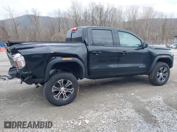 ✅ 2023 GMC Canyon 4WD AT4 • VIN: 1GTP6DEK9P1151776 • Lot: 41655533. Listed on IAAI with 11,750 mi. Free auction sales archive from the USA and detailed vehicle history report at DreamBid. Image 13.