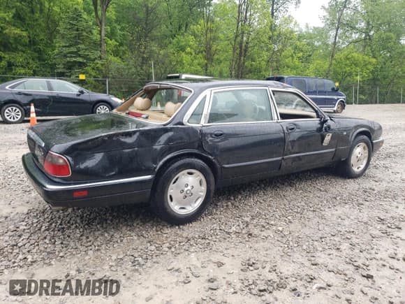 ✅ 1997 Jaguar XJ • VIN: SAJHX6248VC806189 • Лот: 57891035. Опубликован ранее на Copart с пробегом 51 654 миль. Бесплатный доступ к архиву аукционных продаж из США и подробный отчёт об истории автомобиля на DreamBid. Изображение 3.