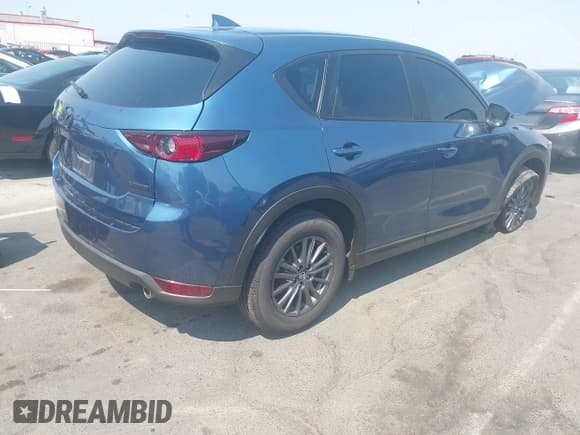 ✅ 2021 Mazda CX-5 Touring • VIN: JM3KFACM8M1305071 • Лот: 42918048. Опубликован ранее на IAAI с пробегом 64 672 миль. Бесплатный доступ к архиву аукционных продаж из США и подробный отчёт об истории автомобиля на DreamBid. Изображение 4.