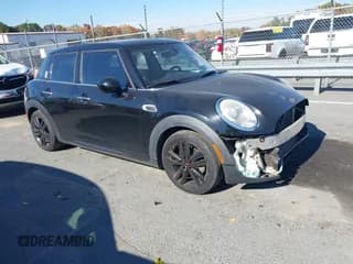 ✅ 2015 MINI Hardtop 4 Door • VIN: WMWXS5C59FT830719 • Lot: 43610367. Listed on IAAI with 90,169 mi. Free auction sales archive from the USA and detailed vehicle history report at DreamBid. Image 1.