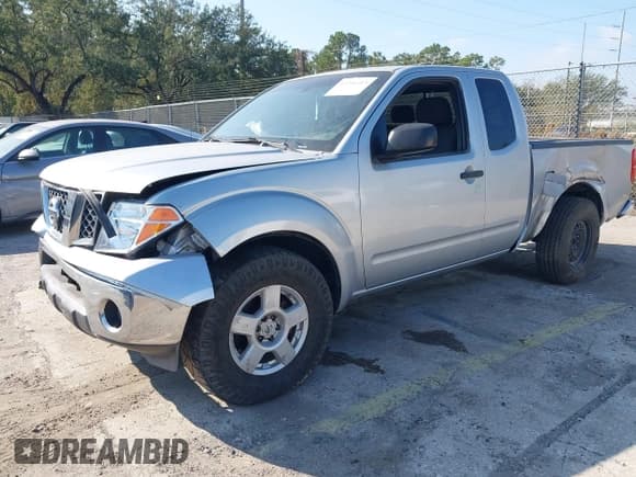 ✅ 2007 Nissan Frontier SE • VIN: 1N6AD06U57C453877 • Lot: 43706315. Listed on IAAI with 148,836 mi. Free auction sales archive from the USA and detailed vehicle history report at DreamBid. Image 2.
