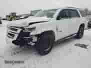 2020 Chevrolet Tahoe Premier with VIN 1GNSKCKJXLR182971, listed as a Copart auction lot 87268634 with 210,000 mi miles and Salvage title. Bid and sale history available at DreamBid. Image 1.