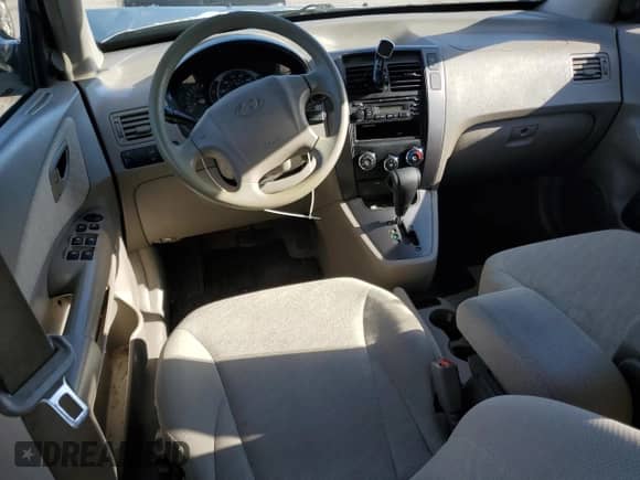 2005 Hyundai Tucson GL z VIN KM8JM12B55U119266, wystawiony jako Copart lot #79095984 z przebiegiem 114 939 mil mil oraz Szkoda całkowita • Salvage title. Historia ofert i sprzedaży dostępna na DreamBid. Obrazek 8.