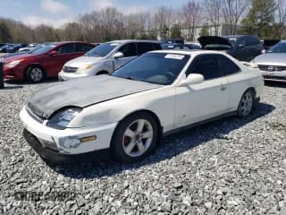 ✅ 1998 Honda Prelude • VIN: JHMBB6145WC009435 • Лот: 54256295. Опубликован ранее на Copart с пробегом 208 067 миль. Бесплатный доступ к архиву аукционных продаж из США и подробный отчёт об истории автомобиля на DreamBid. Изображение 1.