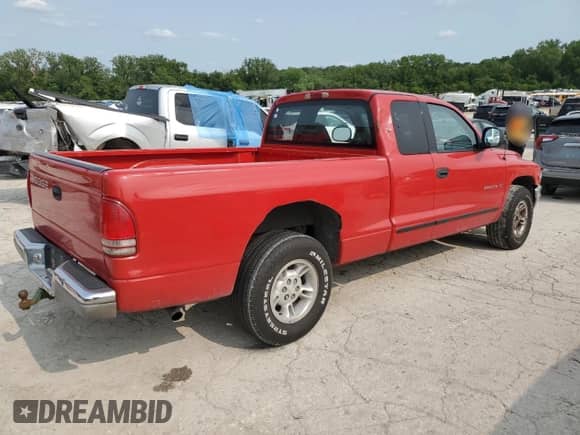 1999 Dodge Dakota SLT z VIN 1B7GL22Y6XS283846, wystawiony jako Copart lot #58123195 z przebiegiem 175 671 mil mil oraz Szkoda całkowita • Salvage title. Historia ofert i sprzedaży dostępna na DreamBid. Obrazek 3.