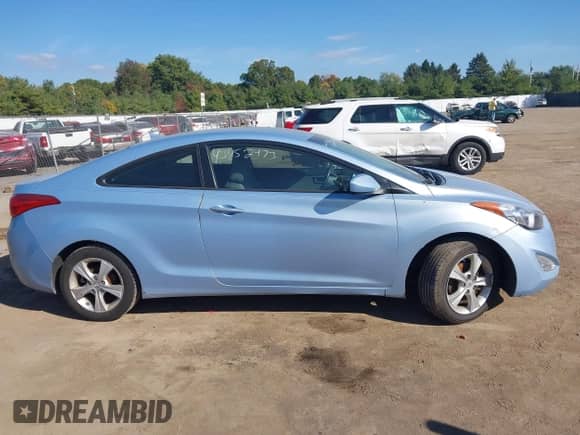 2013 Hyundai Elantra GS z VIN KMHDH6AEXDU006051, wystawiony jako IAAI lot #43452473 z przebiegiem 128 924 mil mil oraz . Historia ofert i sprzedaży dostępna na DreamBid. Obrazek 14.