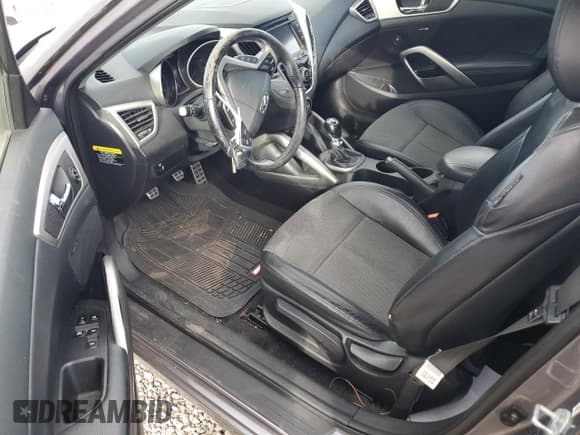 ✅ 2014 Hyundai Veloster • VIN: KMHTC6AD4EU184184 • Lot: 75909334. Wystawiony na Copart z przebiegiem 124 962 mil. Bezpłatny archiwum sprzedaży aukcyjnych z USA i szczegółowy raport historii pojazdu na DreamBid. Zdjęcie 8.