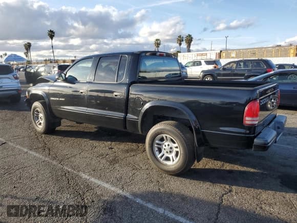 ✅ 2002 Dodge Dakota Sport • VIN: 1B7HG38N82S697439 • Lot: 44282155. Wystawiony na Copart z przebiegiem 239 414 mil. Bezpłatny archiwum sprzedaży aukcyjnych z USA i szczegółowy raport historii pojazdu na DreamBid. Zdjęcie 2.