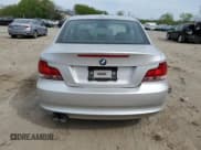 ✅ 2009 BMW 1 Series 128i • VIN: WBAUP73579VK74936 • Лот: 54558905. Опубликован ранее на Copart с пробегом 128 563 миль. Бесплатный доступ к архиву аукционных продаж из США и подробный отчёт об истории автомобиля на DreamBid. Изображение 6.