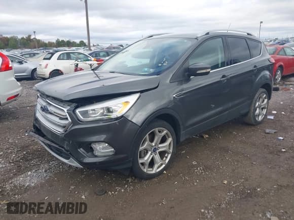 ✅ 2019 Ford Escape Titanium • VIN: 1FMCU9J9XKUB42852 • Lot: 43446112. Listed on IAAI with 83,336 mi. Free auction sales archive from the USA and detailed vehicle history report at DreamBid. Image 17.