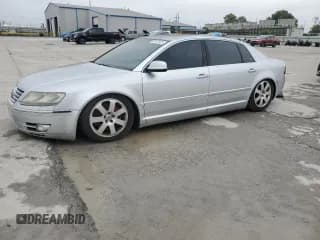 ✅ 2004 Volkswagen Phaeton V8 • VIN: WVWAF63D148007986 • Lot: 69487525. Wystawiony na Copart z przebiegiem 163 503 mil. Bezpłatny archiwum sprzedaży aukcyjnych z USA i szczegółowy raport historii pojazdu na DreamBid. Zdjęcie 1.