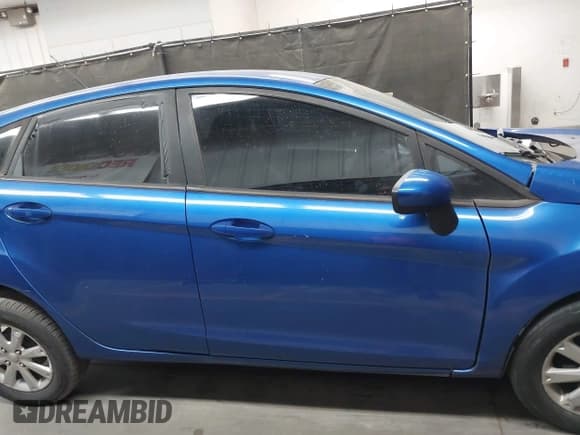 ✅ 2011 Ford Fiesta SE • VIN: 3FADP4EJ3BM129913 • Lot: 42304442. Listed on IAAI with 168,576 mi. Free auction sales archive from the USA and detailed vehicle history report at DreamBid. Image 13.